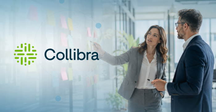 Two professionals discussing data strategy with the Collibra logo, showing how Collibra and MDM work together.